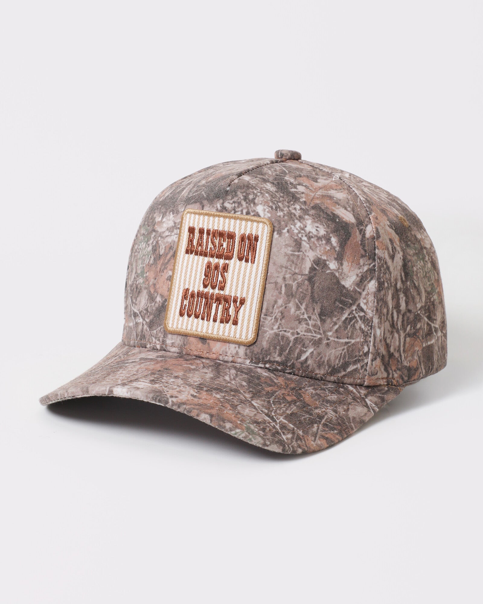 Raised On 90s Country Patch Camo Trucker Hat - Monster Artwork